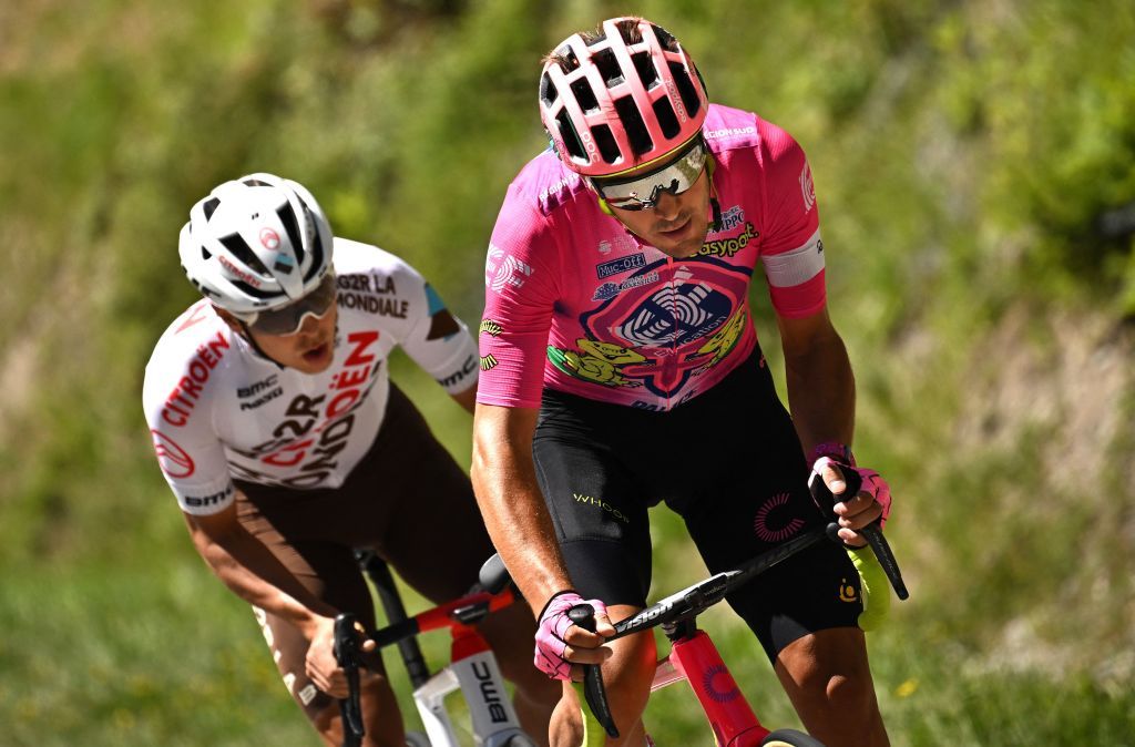 EF EducationEasypost teams Italian rider Alberto Bettiol R and AG2R Citroen Teams Fench rider Benoit Cosnefroy L cycle in a breakaway during the 10th stage of the 109th edition of the Tour de France cycling race 1481 km between Morzine and Megeve in the French Alps on July 12 2022 Photo by Marco BERTORELLO AFP Photo by MARCO BERTORELLOAFP via Getty Images