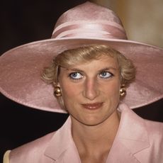 diana, princess of wales 1961 1997 visits a school for the deaf and dumb in yaoundé, cameroon, march 1990 she is wearing a pink and yellow suit by catherine walker and a philip somerville hat photo by jayne fincherprincess diana archivegetty images