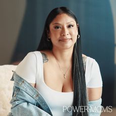 Angelica Vargas seated in a white top and denim jacket.