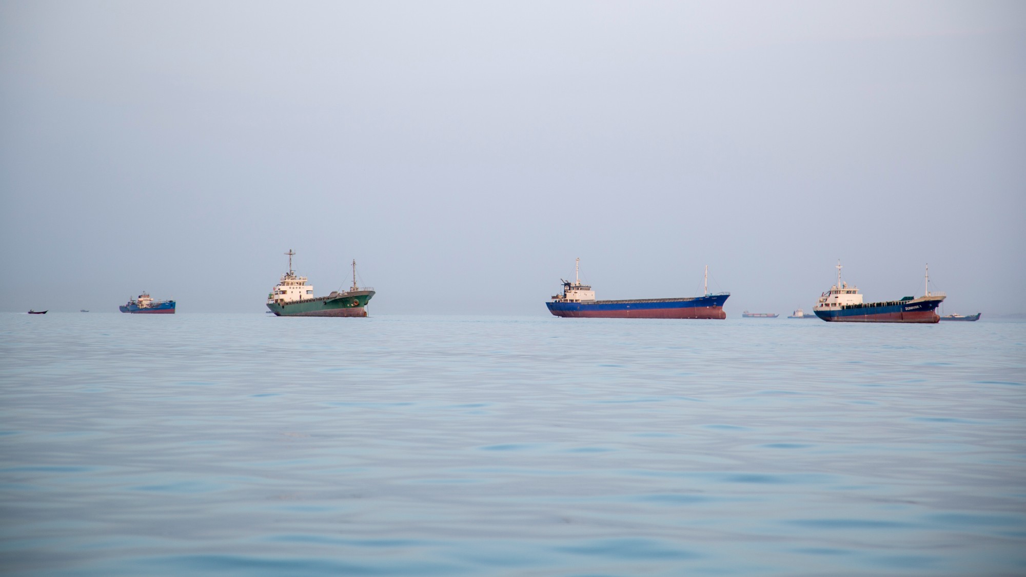 Iranian ships anchored near the shoreline