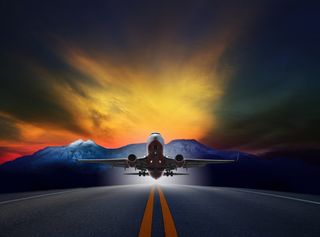 An image of a plane taking off against a highly stylised backdrop