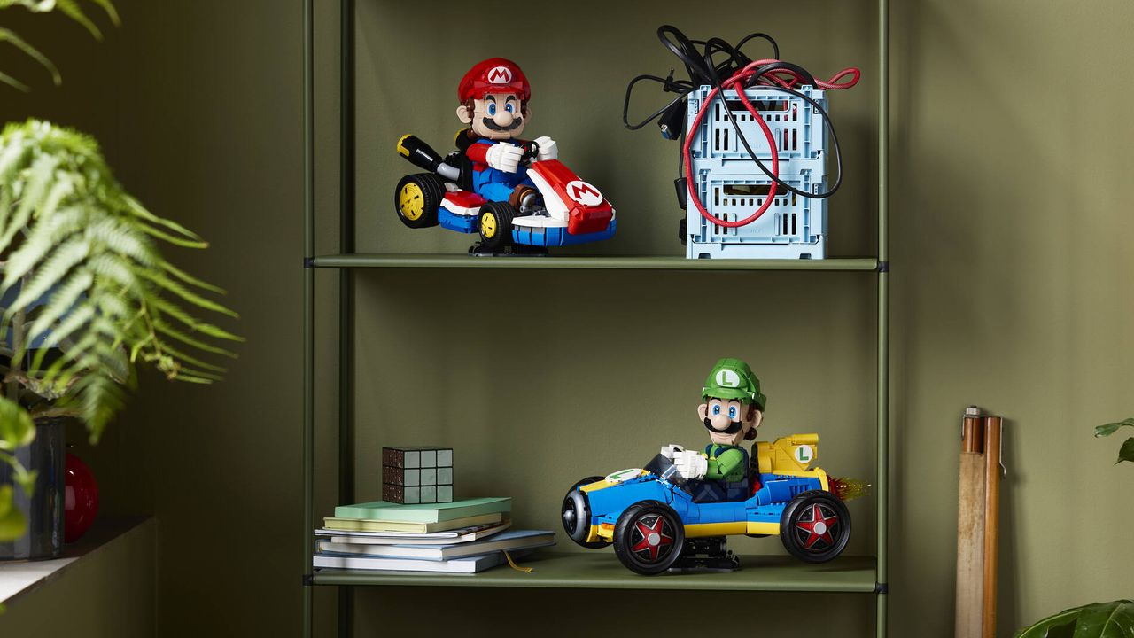 Lego Luigi &amp; Mach 8 set and Mario &amp; Standard Kart kit on a shelving unit