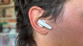 Me wearing the Liberty 5 earbuds. 