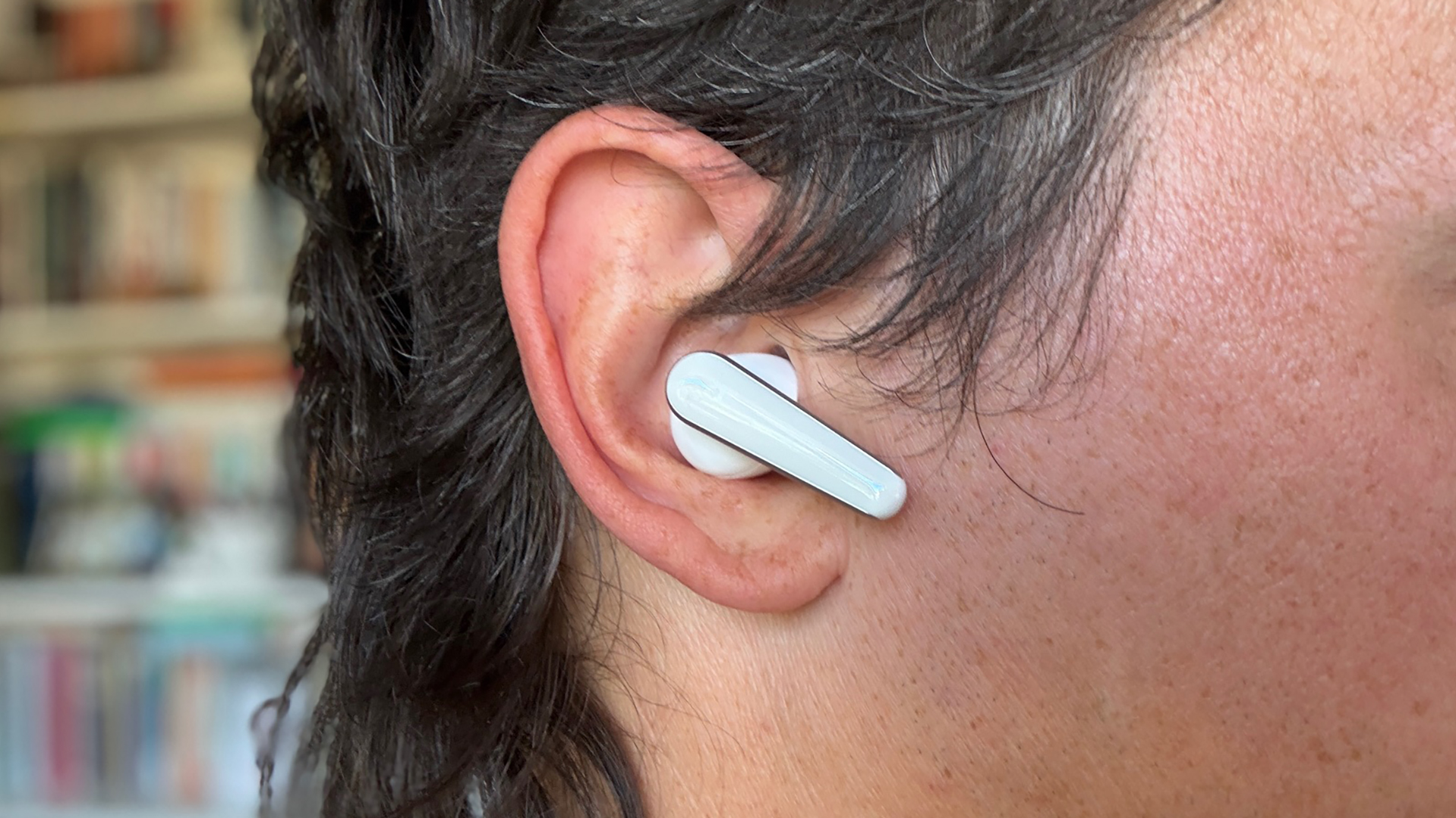 Me wearing the Liberty 5 earbuds. 