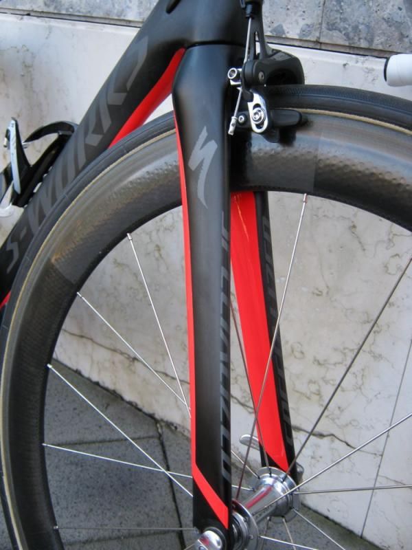 The UCI-legal FACT carbon fork is bladed for maximum aerodynamics