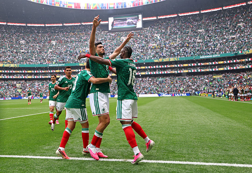Raul Jimenez #9 of Mexico celebrates with teammates after scoring the team's second goal during the FIFA World Cup 2026 Group A match between Mexico and South Africa at Mexico City Stadium