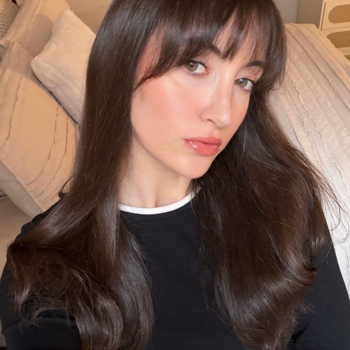 Images of Who What Wear associate beauty editor Alyssa Brascia with long, shiny brown hair.