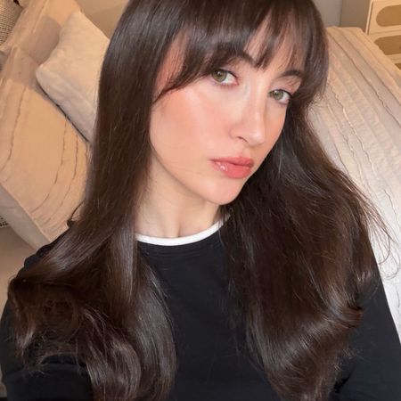 Images of Who What Wear associate beauty editor Alyssa Brascia with long, shiny brown hair.