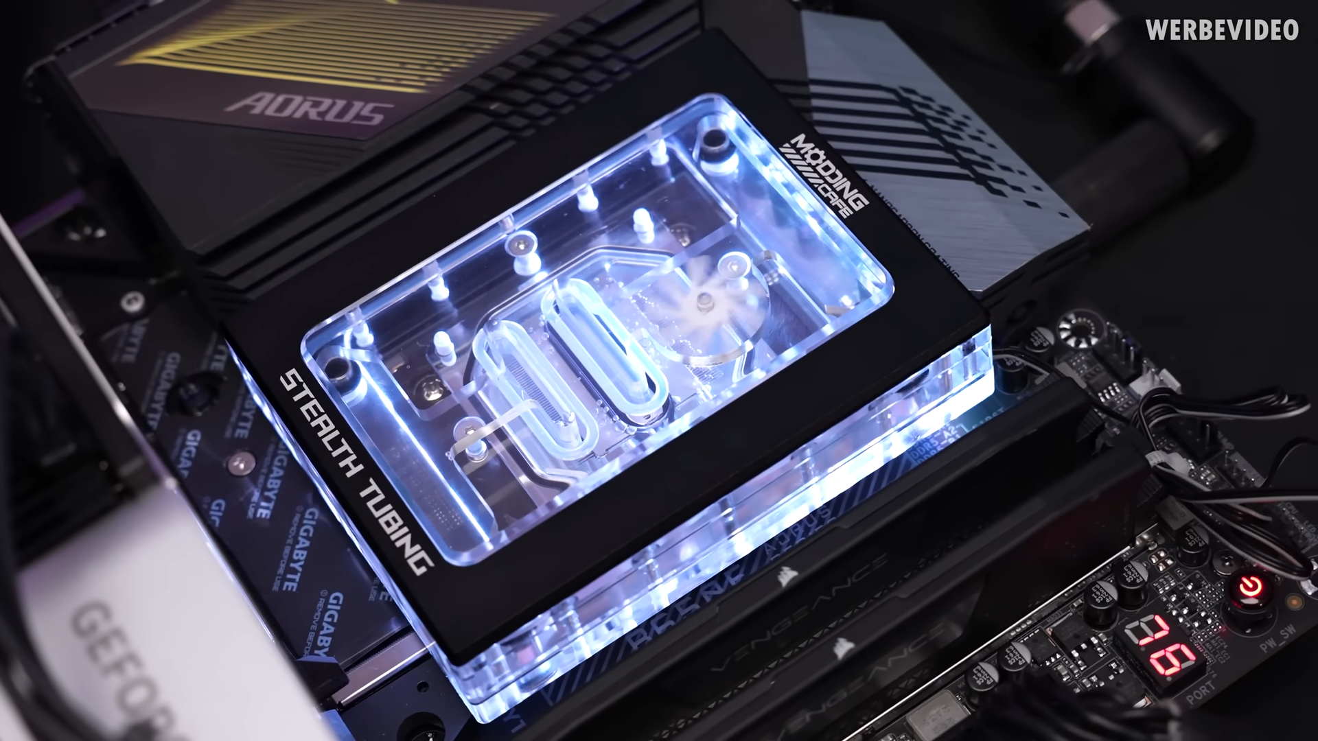 'Tube-less' CPU Waterblock Hides Tubes Behind Motherboard | Tom's Hardware