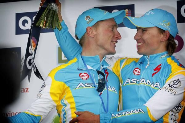 Maxim Iglinskiy and Enrico Gasparotto (Astana) celebrate on the podium.