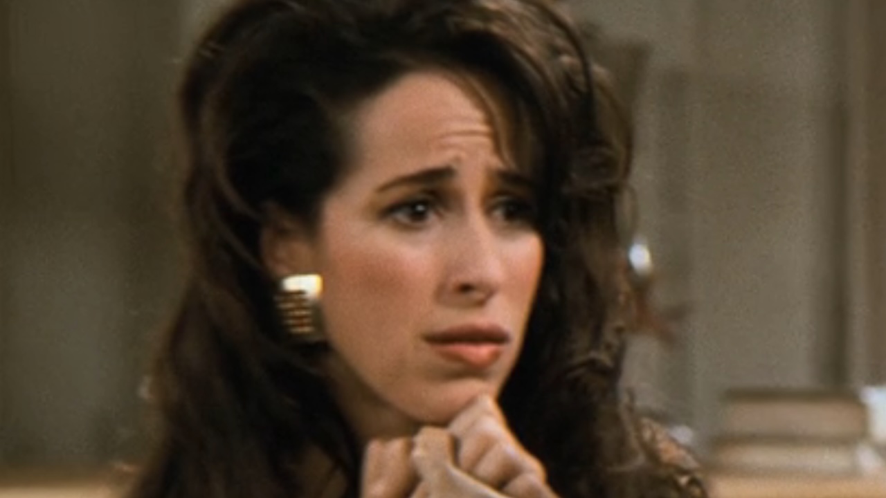 Maggie Wheeler as Janice in Friends looking worried. 