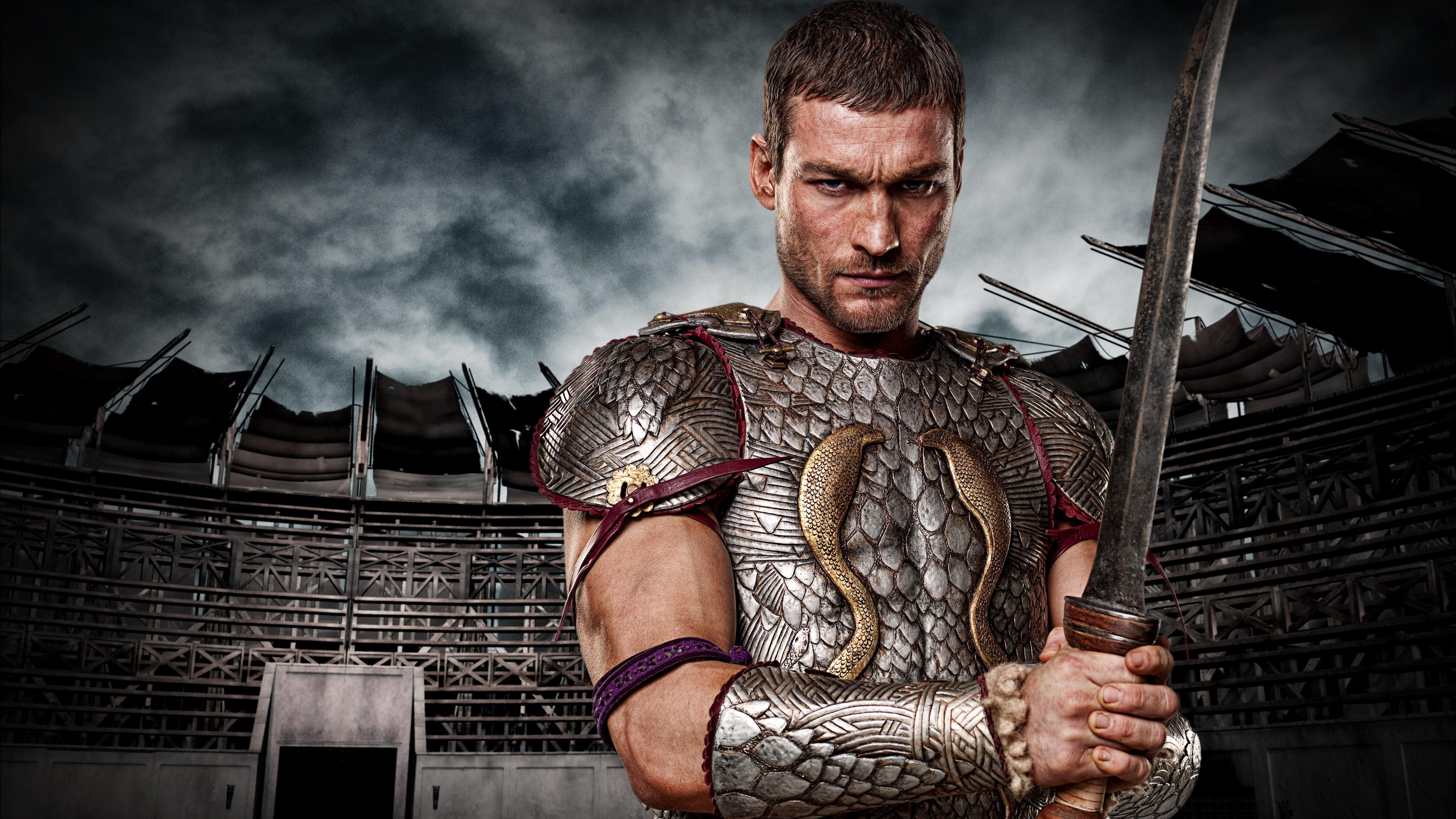 Andy Whitfield brandishes a sword in a promotional still for Starz drama &quot;Spartacus: Blood and Sand&quot;