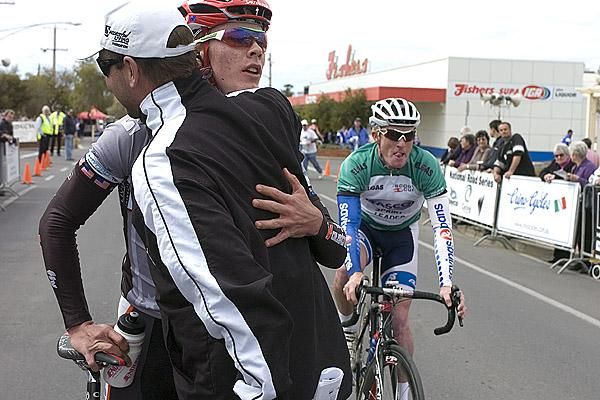 Michael Hepburn is congratulated by his Fly V Australia team-manger Henk Vogels after winning his second stage of the Tour in Merbein.