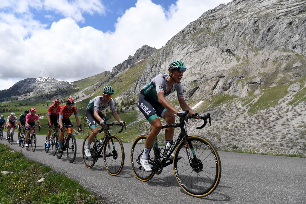 Breakaway riders compete during the eighth stage of the 73rd edition of the Criterium du Dauphine cycling race a 147km between La LechereLesBains and Les Gets on June 6 2021 Photo by Alain JOCARD AFP Photo by ALAIN JOCARDAFP via Getty Images