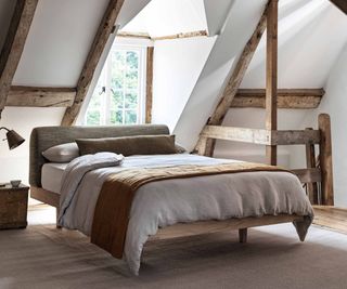Naturalmat Organic Hemp Bedding on a bed beneath a skylight.