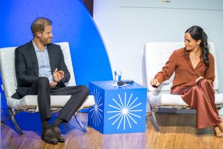 Prince Harry, Duke of Sussex and Meghan, Duchess of Sussex speak onstage at EAN University during a visit around Colombia on August 15, 2024 in Bogota, Colombia.