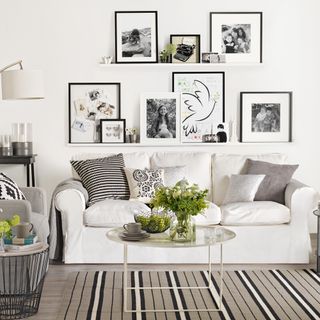 photo gallery with white wall and sofa
