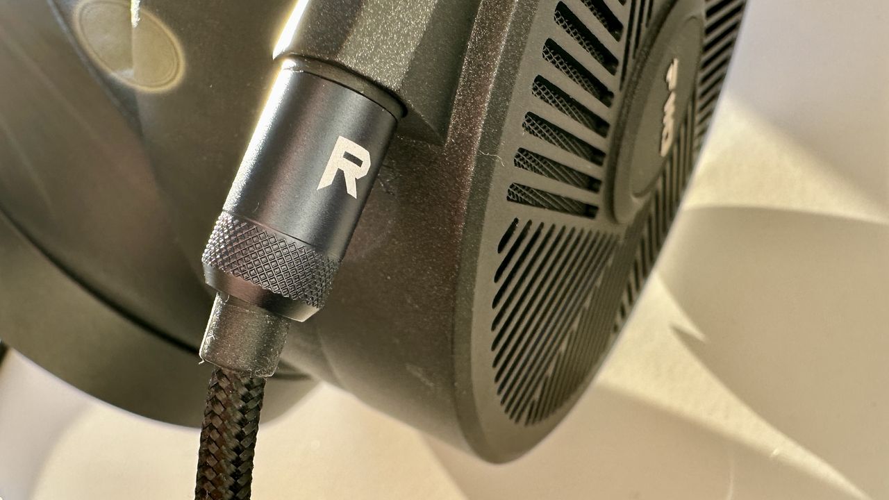 Fiio FT5 closeup of the right earcup connector, outside on a nice day