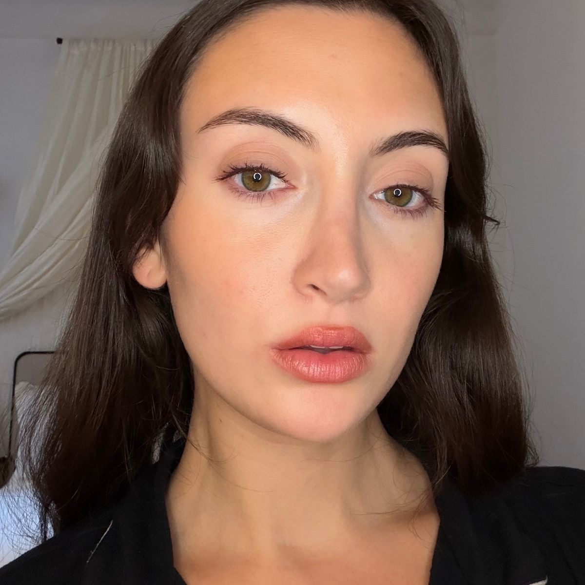 Who What Wear associate beauty editor Alyssa Brascia wearing the Marc Jacobs Nude Awakening Hydrating Medium Coverage Concealer.