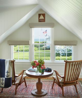 coastal bedroom with a window seating area