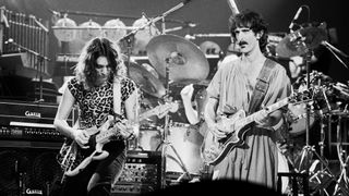 Steve Vai (left) and Frank Zappa perform in New York City in 1981