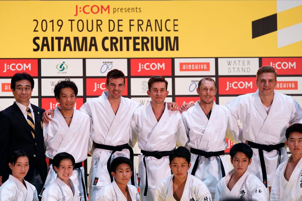 Riders do karate and football-darts before the 2019 Saitama Tour de France criterium