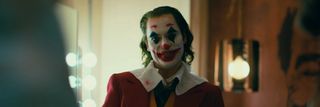 Joaquin Phoenix in full clown gear for Joker