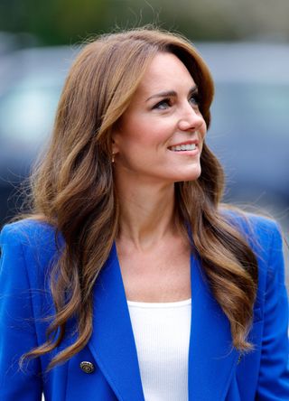 Kate Middleton wearing a blue blazer.