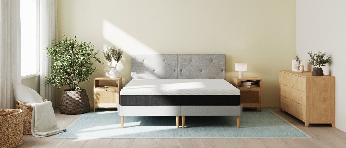 The Emma NextGen Cooling Mattress on a bed frame in a bedroom