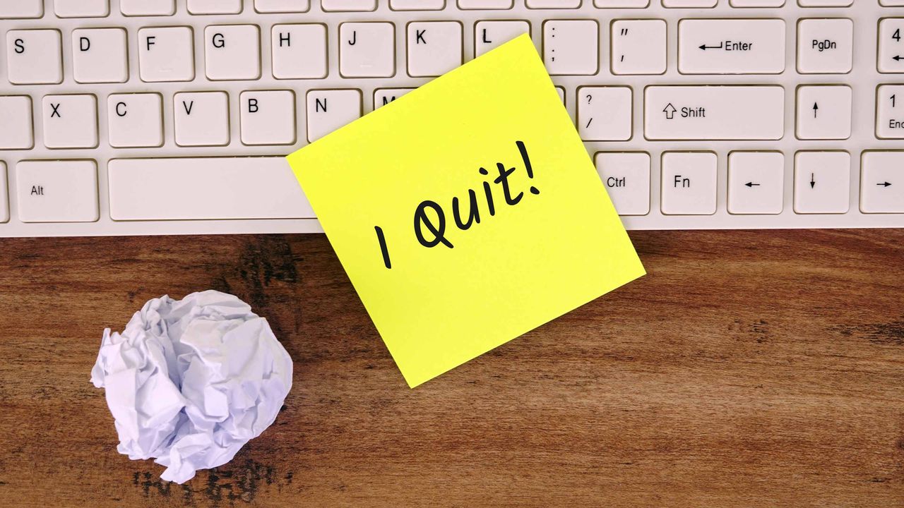 A Post-It Note on a computer keyboard reads, &amp;quot;I Quit!&amp;quot;