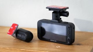 Miofive S1 Ultra dashcam on a wooden table