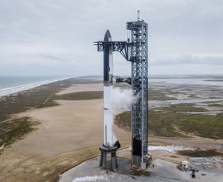 SpaceX performed a Starship wet dress rehearsal on Jan. 23, 2023, fueling the giant vehicle up for the first time ever. As this photo shows, the stainless-steel Starship went frosty white after the loading of supercold propellant.