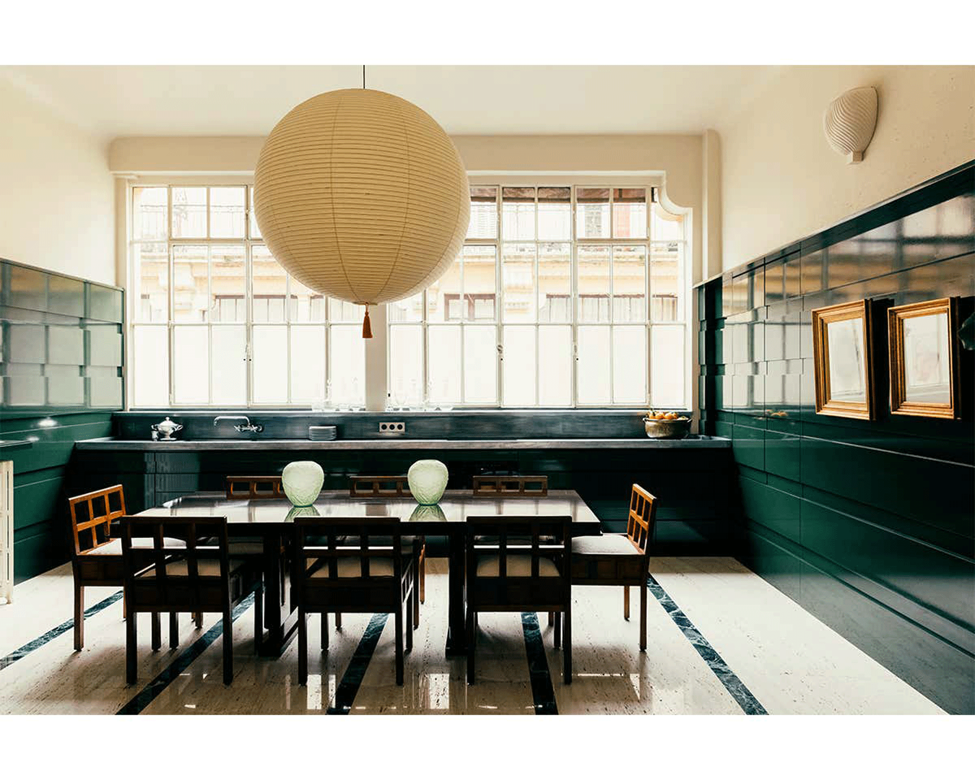 kitchen with oversized paper lantern over dining table, statement lighting