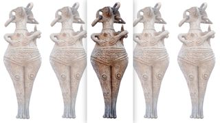 The tombs held figurines of goddesses sporting bird faces. This is likely a goddess with a bird's head holding a child that is half bird and half human.