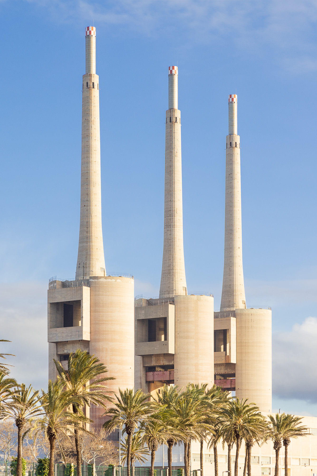 Three Chimneys, a concrete factory featuring three tall chimneys