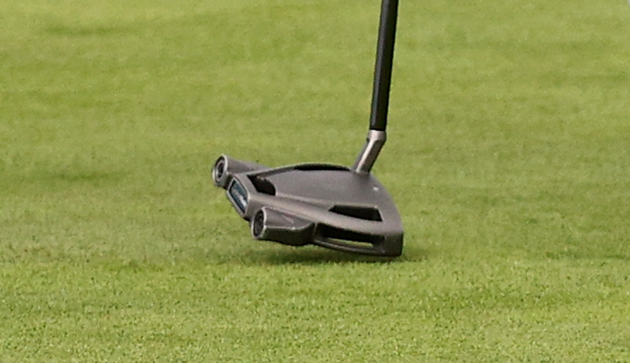 A close up of Jacob Bridgeman's putter
