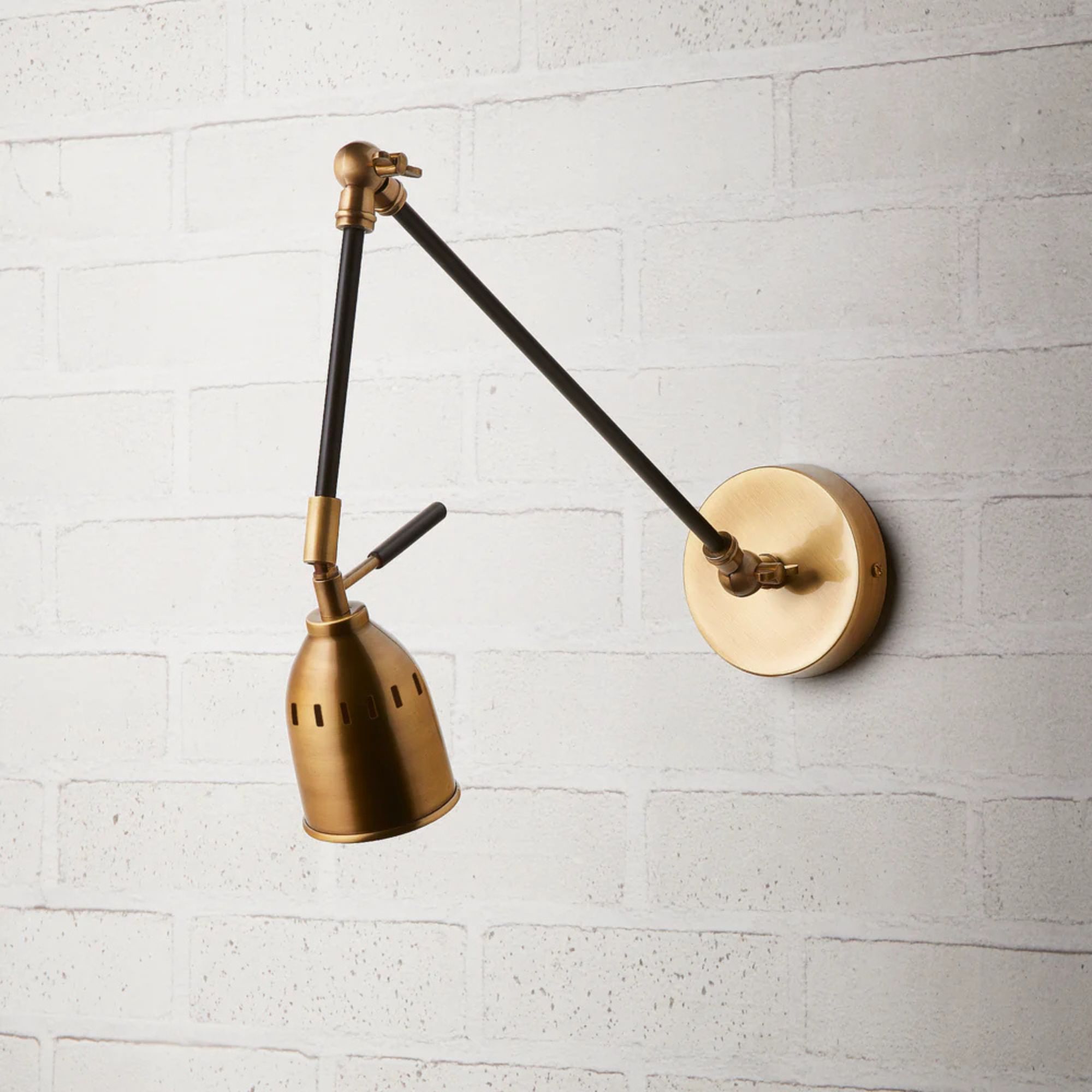Pick Wall Sconce in Black and Antiqued Brass