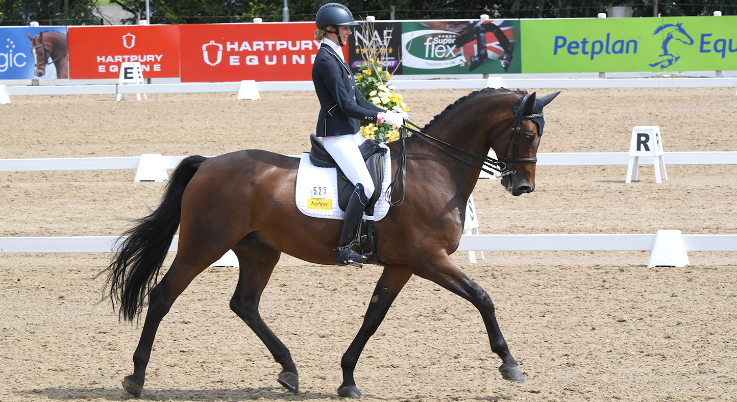 Kate Cowell and Rayban on their way to winning the advanced medium gold at the Winter Dressage Championships 2020