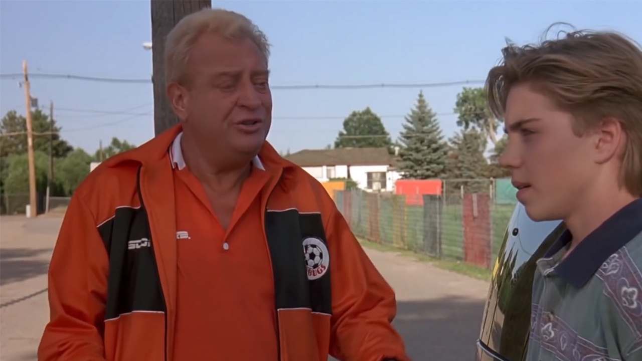 Rodney Dangerfield in an orange coaches outfit in Ladybugs