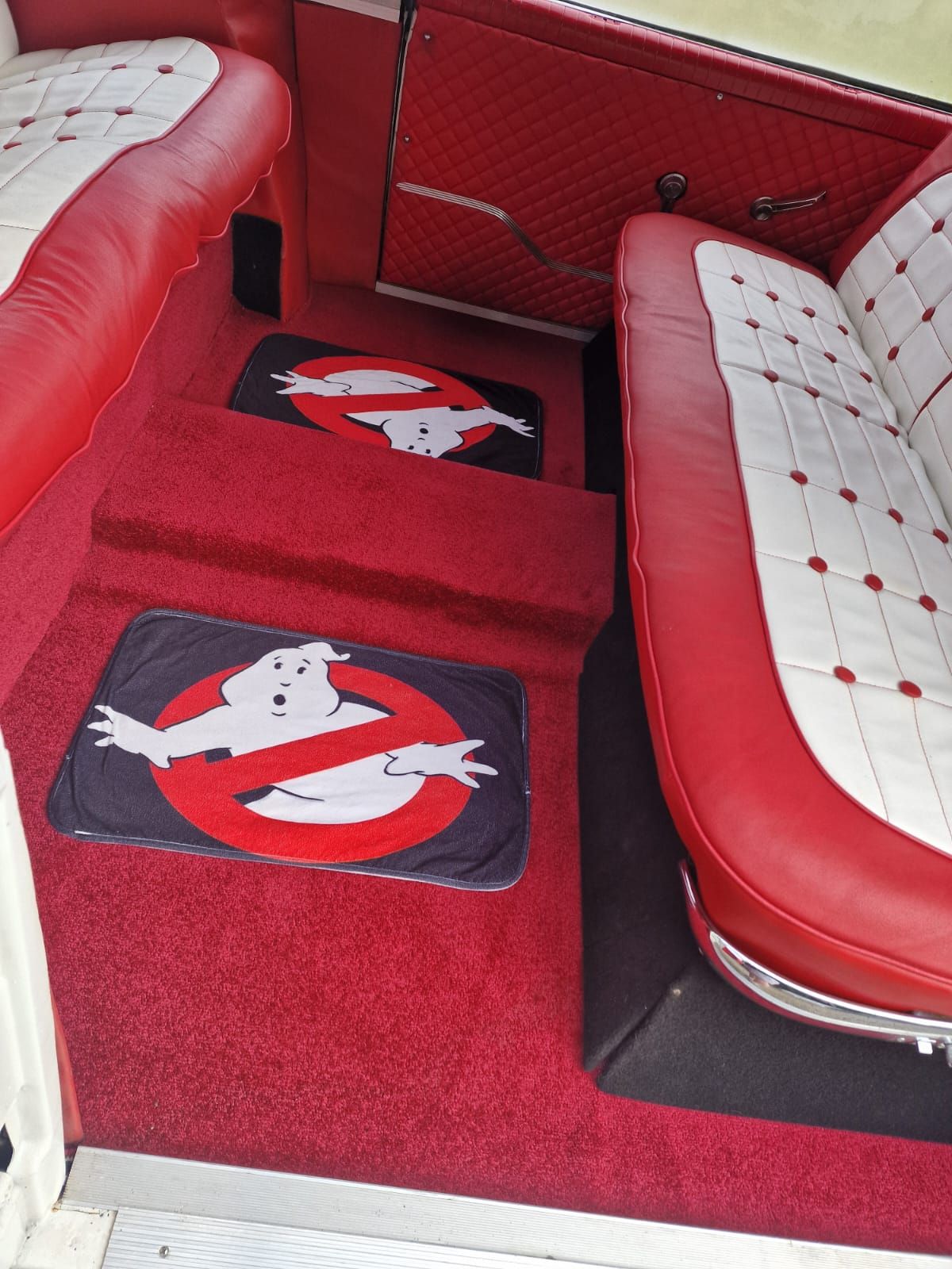 Images of the Ghostbusters car. It looks like the Ghostbusters car, but also it's parked outside of your parents house for some reason