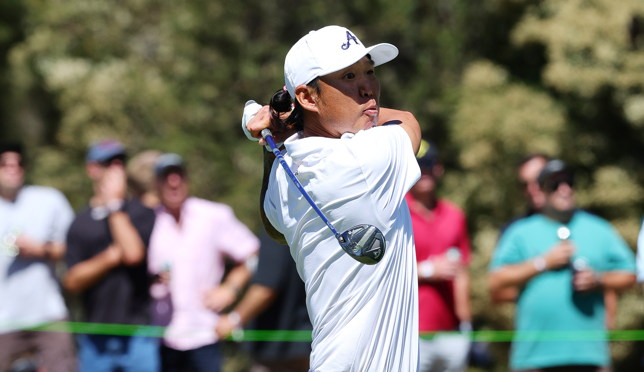 Anthony Kim hits a fairway wood