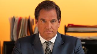 Michael Weatherly's Tony DiNozzo sitting at his desk in NCIS