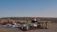 Six Senses Shaharut resort, seating and fire in desert in Israel