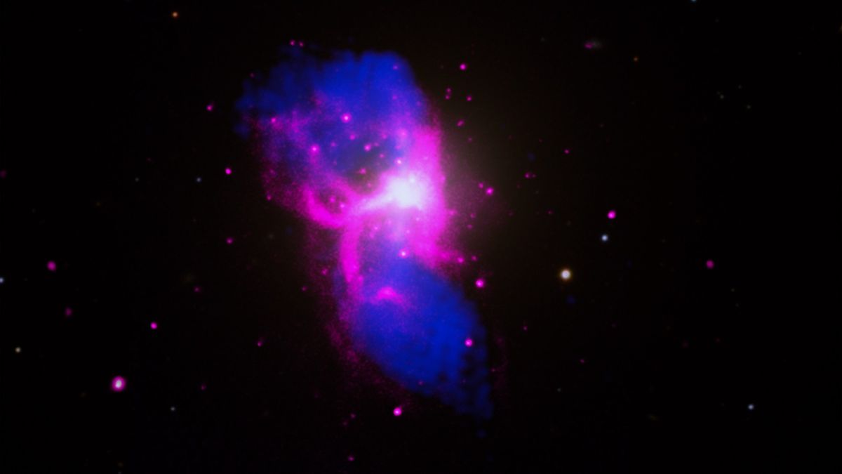 Monstrous black hole belches hot gas in a glowing ‘H’ shape (photos)