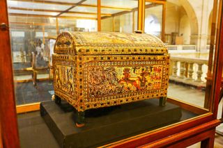 A painted wooden box that was found in Tutankhamun's tomb. It has depictions of hunting scenes on it.