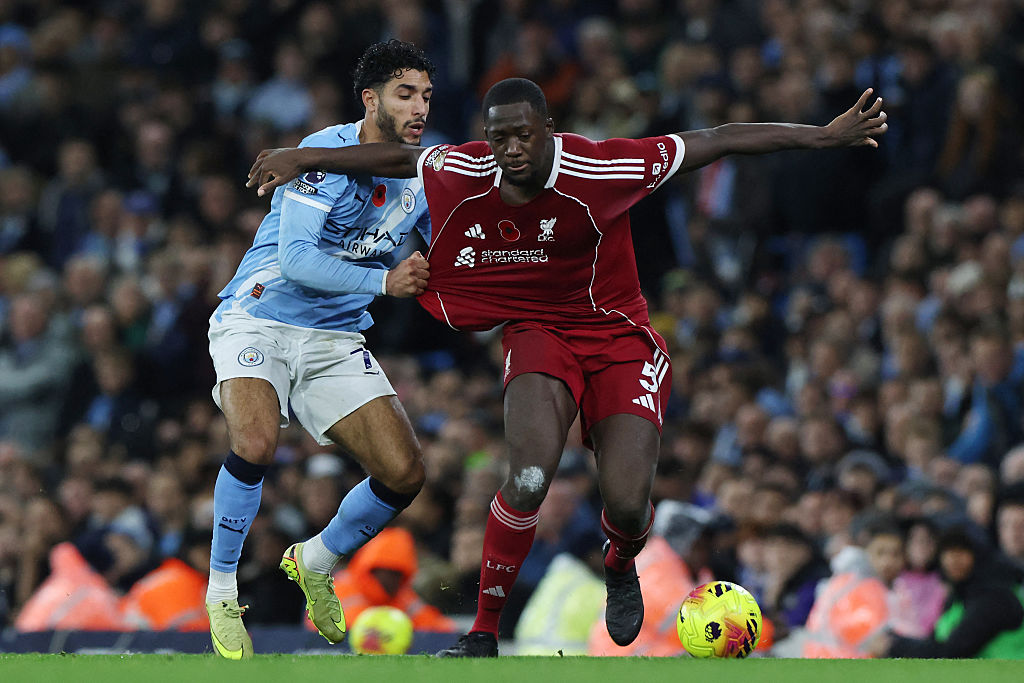 Manchester City&#039;s Egyptian striker #07 Omar Marmoush (L) pulls the shirt of Liverpool&#039;s French defender #05 Ibrahima Konate (R) during the English Premier League football match between Manchester City and Liverpool at the Etihad Stadium in Manchester, north west England, on November 9, 2025. (Photo by Darren Staples / AFP) / RESTRICTED TO EDITORIAL USE. No use with unauthorized audio, video, data, fixture lists, club/league logos or &#039;live&#039; services. Online in-match use limited to 120 images. An additional 40 images may be used in extra time. No video emulation. Social media in-match use limited to 120 images. An additional 40 images may be used in extra time. No use in betting publications, games or single club/league/player publications. /