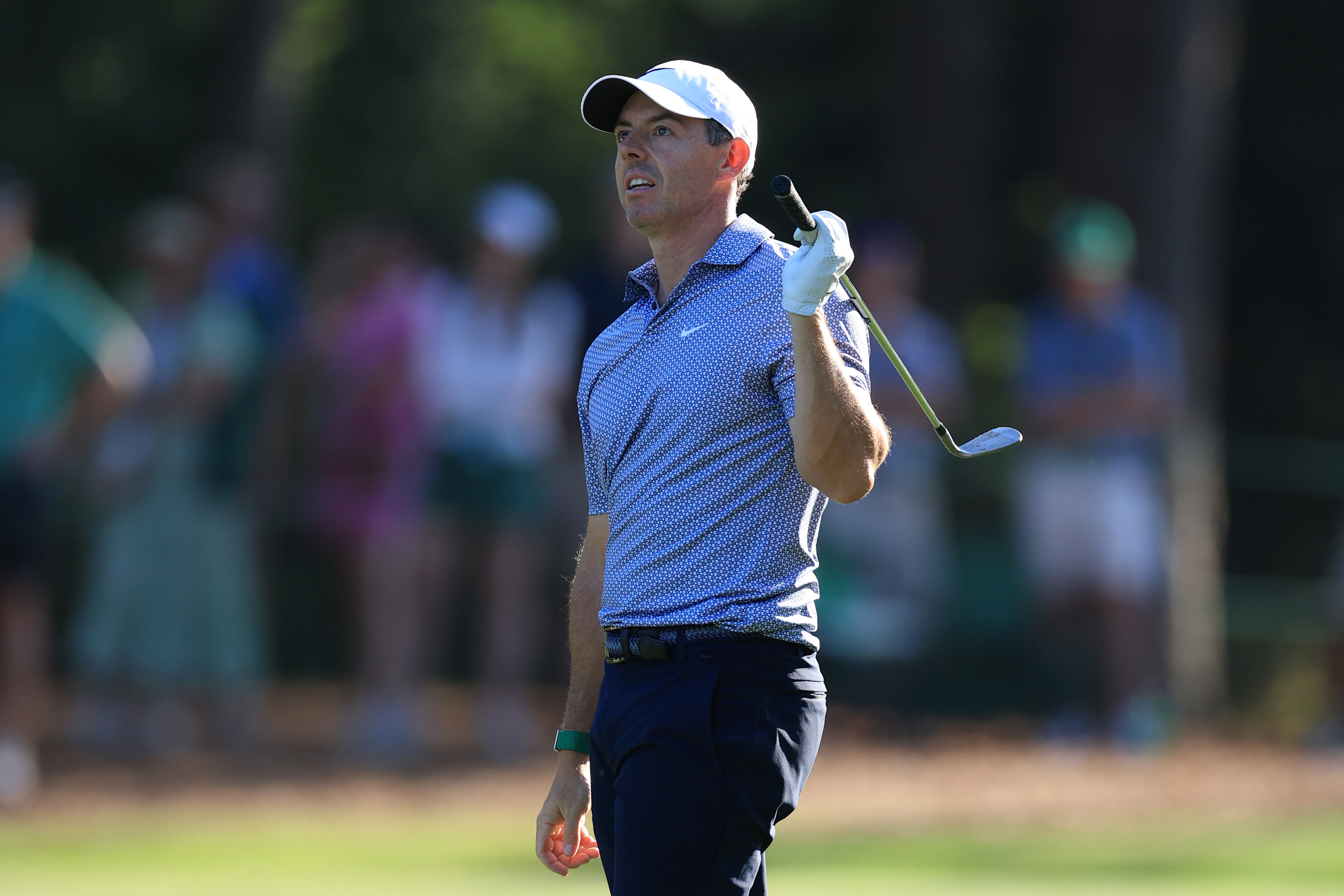 Rory McIlroy reacts to his second shot on the 14th hole during the third round of the 2026 Masters Tournament at Augusta National Golf Club
