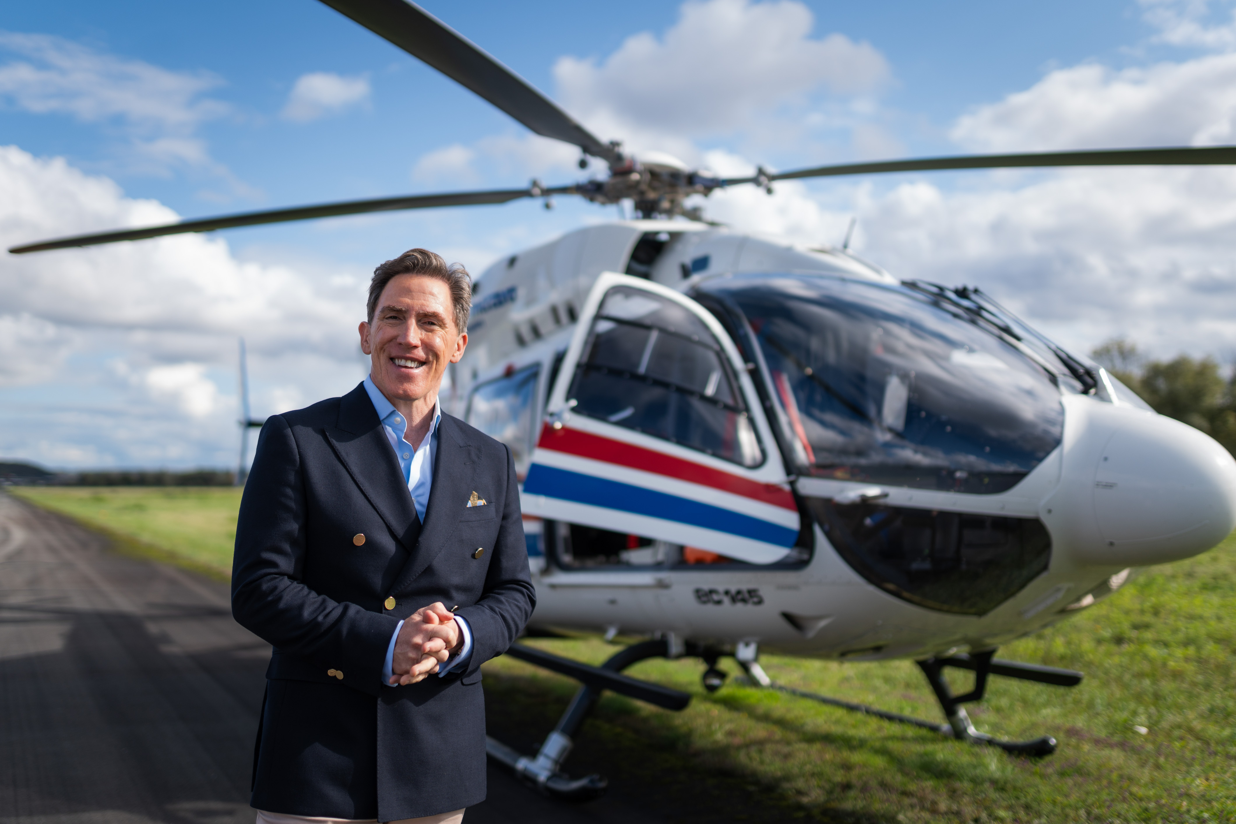 Rob Brydon takes a helicopter in Destination X.