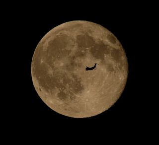 Full Moon with Airplane