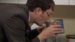 Dwight sipping from a big can in The Office